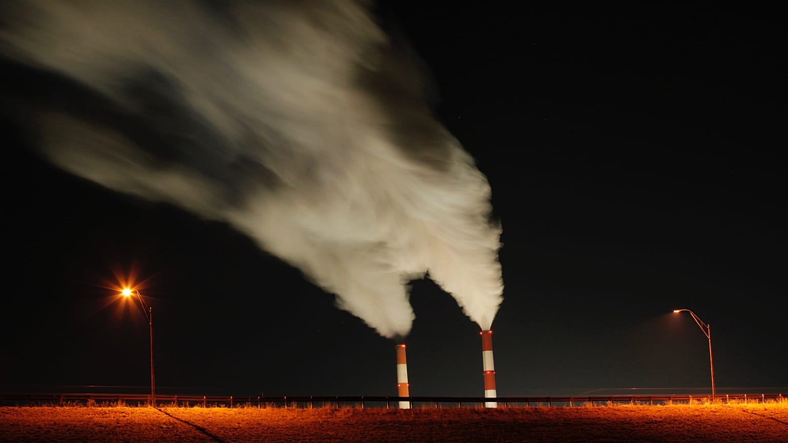  In this Jan. 19, 2012 file photo, smoke rises in this time exposure image from the stacks of the La Cygne Generating Station coal-fired power plant in La Cygne, Kan