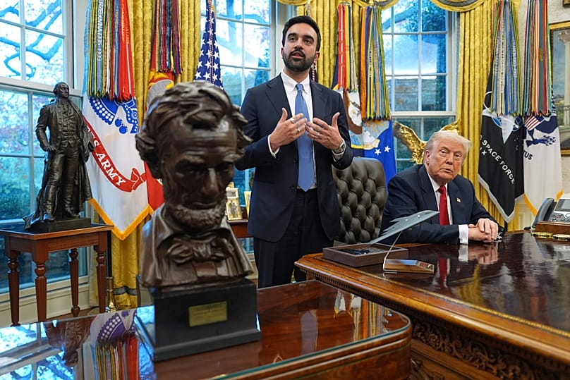 President Donald Trump listens as New York City Mayor-elect Zohran Mamdani speaks in the Oval Office of the White House, Friday, Nov. 21, 2025, in Washington. (AP Photo/Evan V