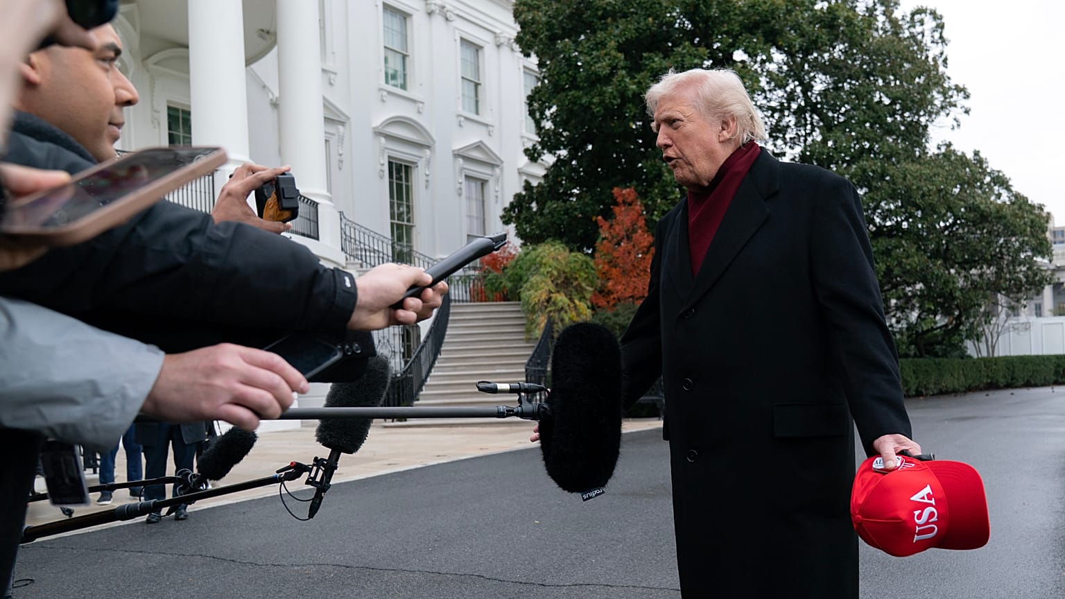 President Donald Trump talks to reporters as he departs from the South Lawn of the White House, Saturday