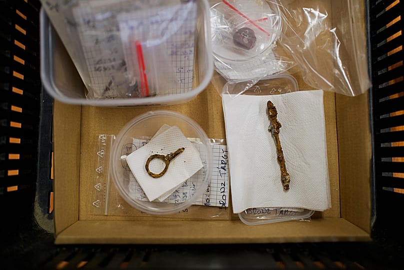 Belongings of a Roman-era woman are seen in a box after archaeologists found the items in an intact Roman sarcophagus, Wednesday, Nov. 19, 2025 in Budapest, Hungary.