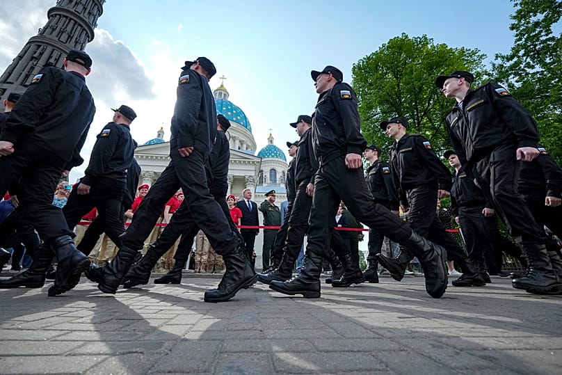 FILE: Russian conscripts march during a send-off event before mandatory one-year military service in front of the Trinity Cathedral in St Petersburg, 23 May 2023