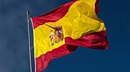 FILE - The Spanish flag flies during a memorial for coronavirus (Covid-19) victims in Madrid, Spain, on 23 October, 2020. 