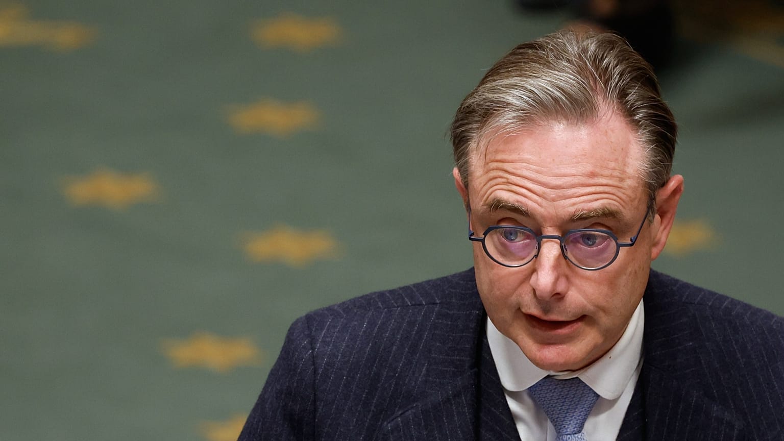 Belgium's Prime Minister Bart De Wever addresses the Belgian Parliament after a meeting of the National Security Council in Brussels, Belgium, Thursday, Nov. 6, 2025.