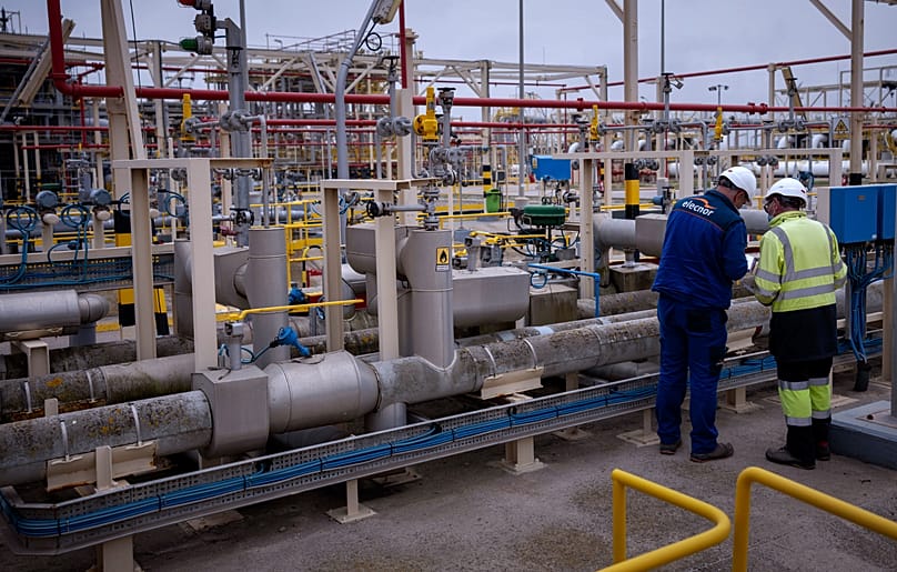 FILE - Operators work at Enagas regasification plant, the largest LNG plant in Europe, in Barcelona, Spain, March 29, 2022. 