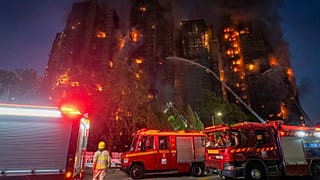 At least 36 dead and hundreds missing in Hong Kong buildings blaze