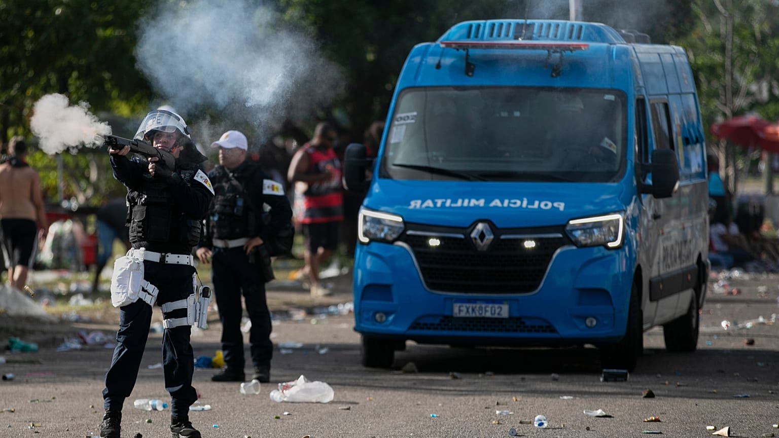 Police clash with Flamengo soccer fans as the team arrives at the airport before flying to Peru for the Copa Libertadores final Rio de Janeiro, Brazil, Nov. 26, 2025