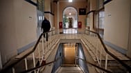 FILE: A security guard walks in the prison's entrance hall of La Sante prison, in Paris, 21 November 2024