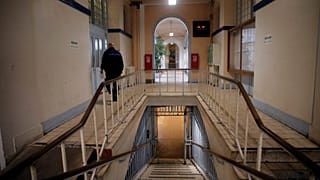 FILE: A security guard walks in the prison's entrance hall of La Sante prison, in Paris, 21 November 2024