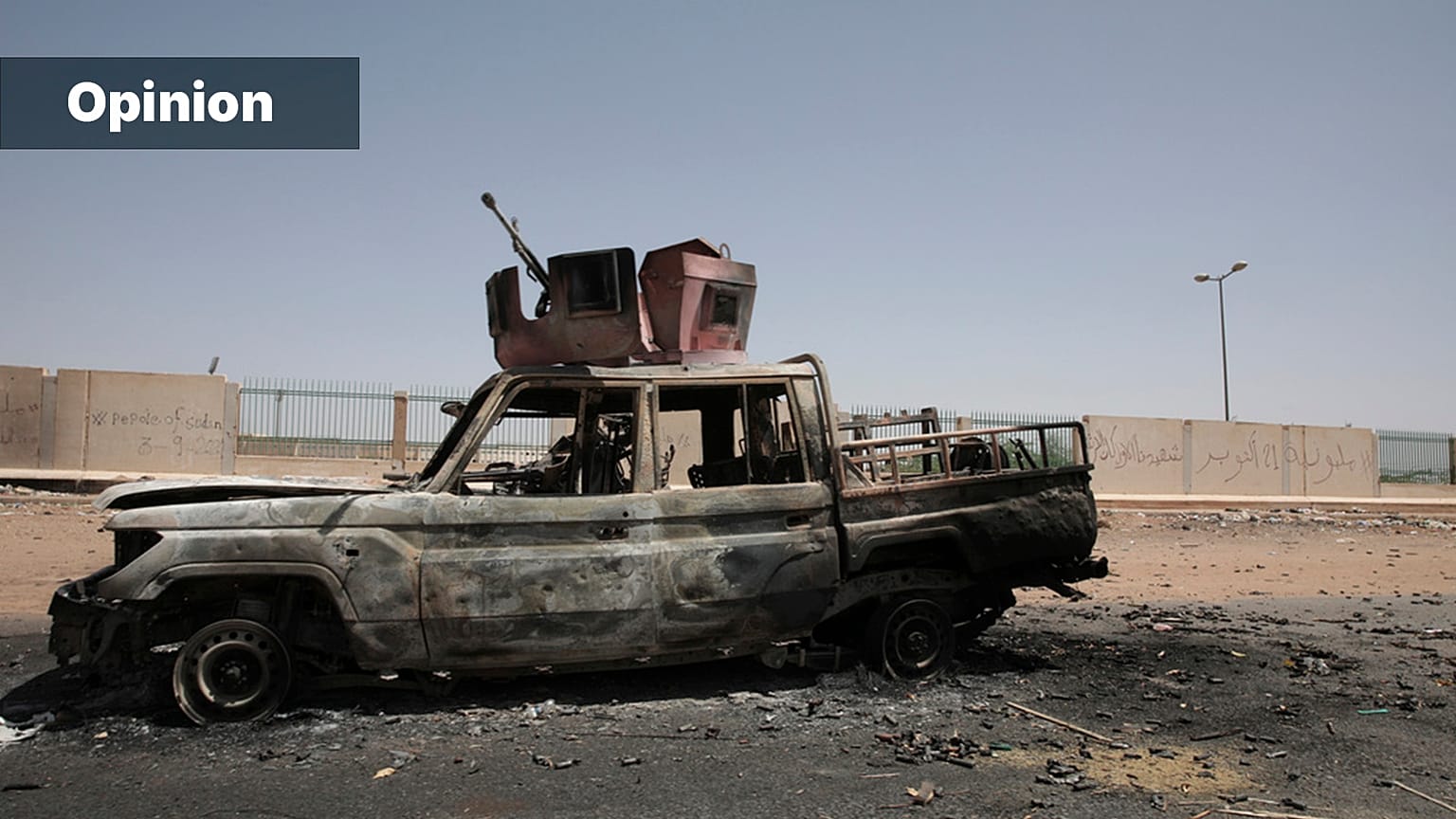 A destroyed military vehicle is seen in southern in Khartoum, Sudan, 20 April 2023