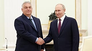  Russian President Vladimir Putin, right, and Hungarian Prime Minister Viktor Orban shake hands during a meeting in Moscow, July 5, 2024. (Valeriy Sharifulin, Sputnik, Kremlin