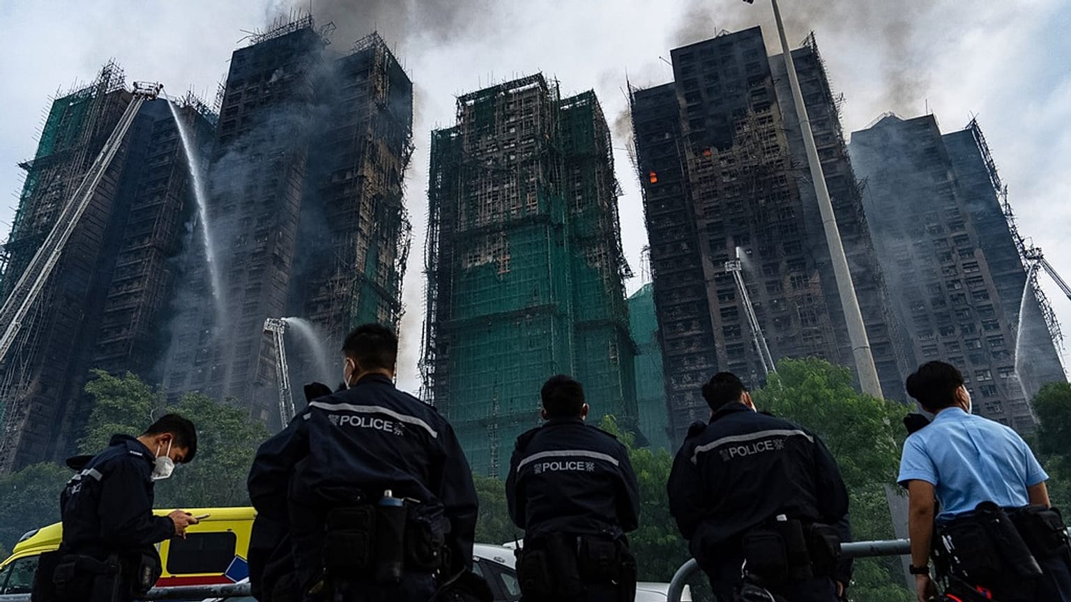 Firefighters work to extinguish a fire which broke out at Wang Fuk Court, a residential estate in the Tai Po district of Hong Kong's New Territories, Thursday, Nov. 27, 2025