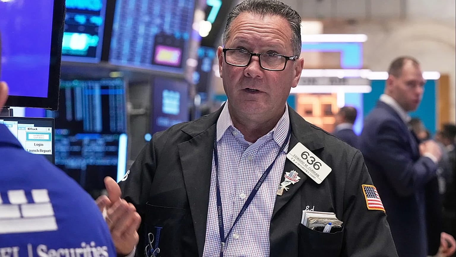 File - Trader Edward Curran works on the floor of the New York Stock Exchange. 24 November 2025.