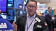 File - Trader Edward Curran works on the floor of the New York Stock Exchange. 24 November 2025.