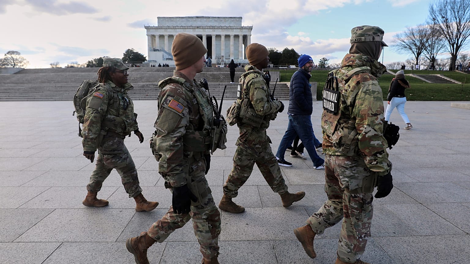 National Guard patrol the National Mall near the Lincoln Memorial, Friday,  28, Nov 2025, in Washington.