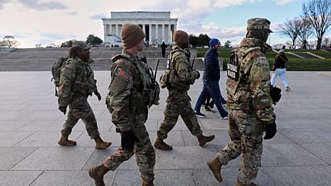 National Guard patrol the National Mall near the Lincoln Memorial, Friday,  28, Nov 2025, in Washington.