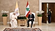 Pope Leo XIV talks with Lebanese President Joseph Aoun as they meet at the Presidential Palace in Beirut, Lebanon, Sunday, Nov. 30, 2025.