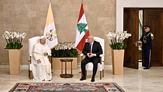 Pope Leo XIV talks with Lebanese President Joseph Aoun as they meet at the Presidential Palace in Beirut, Lebanon, Sunday, Nov. 30, 2025.