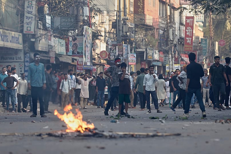 Protesters standoff with police following the verdict against Sheikh Hasina in Dhaka, 17 November, 2025