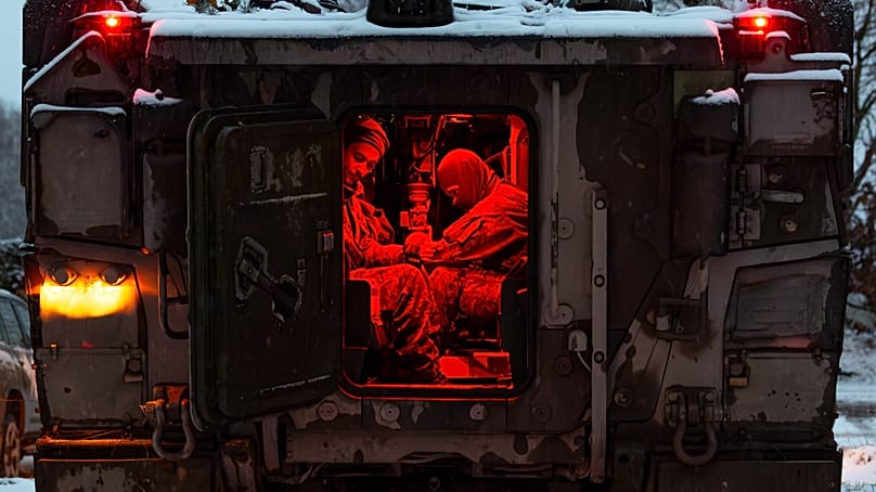 Soldiers from Jägerbataillon 91 prepare for their next mission in the GTK Boxer at the Army Combat Training Centre in Gardelegen, on 28.11.2023