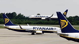 In this Tuesday July 21, 2009 file photo, Ryanair planes are seen at Stansted Airport in England.