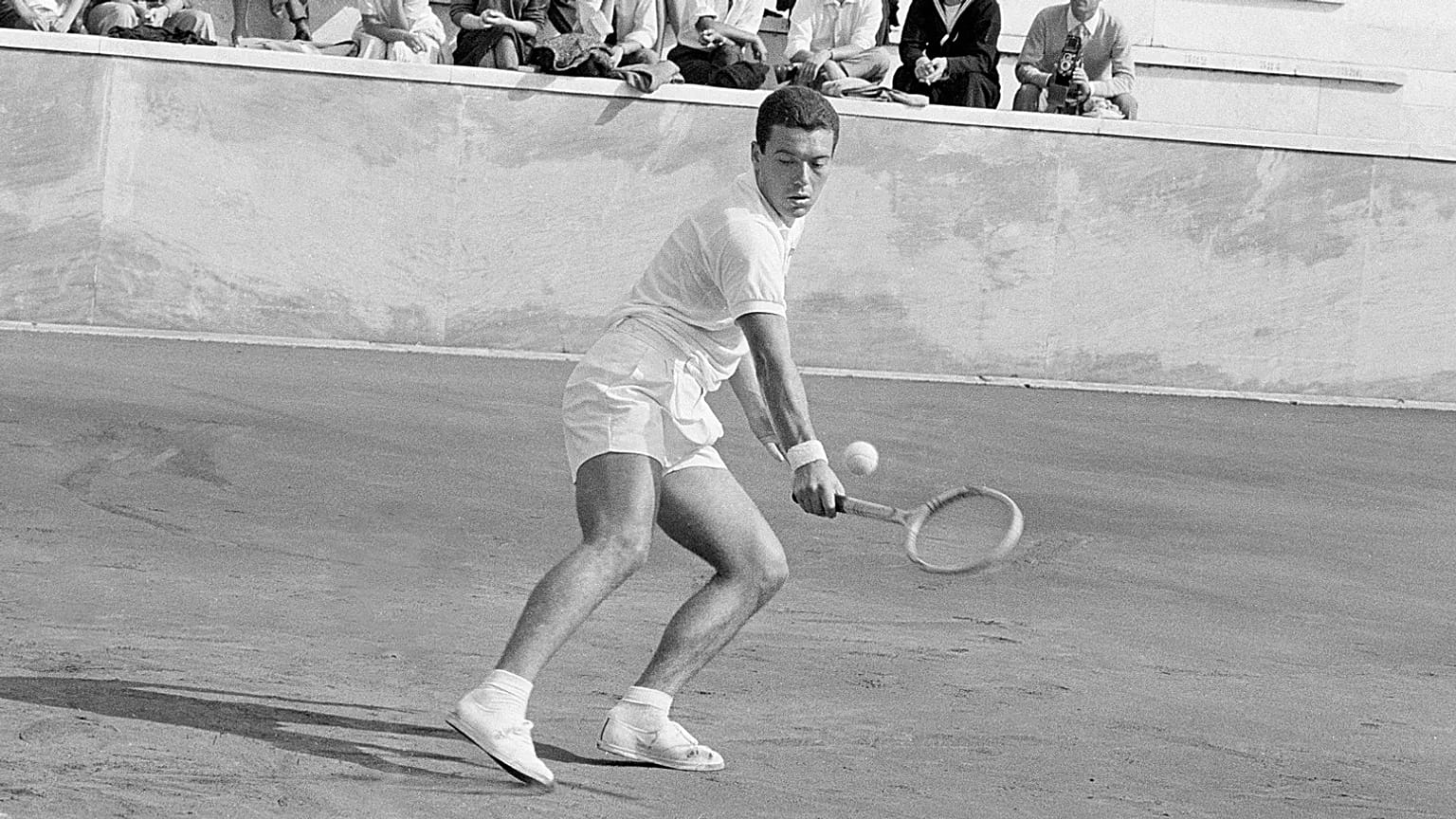 Italy's Nicola Pietrangeli in action during his Davis Cup singles tennis match against United States' Jon Douglas in Rome, 16 October, 1961