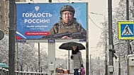 A billboard depicting a Russian soldier fighting in Ukraine. St. Petersburg, Russia, 24 November 2025.