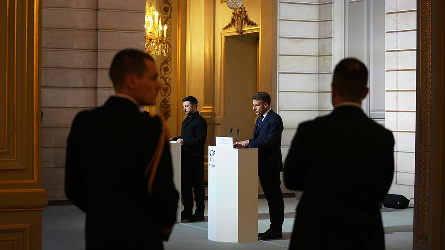 French President Emmanuel Macron, center right, and Ukrainian President Volodymyr Zelenskyy give a joint press conference at the Elysee Palace in Paris, Monday, Dec 1, 2025. 