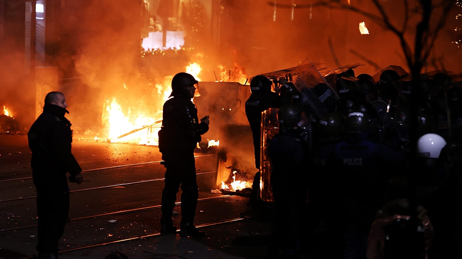 Police clash with protesters during a rally against austerity measures in next year's draft budget, in Sofia