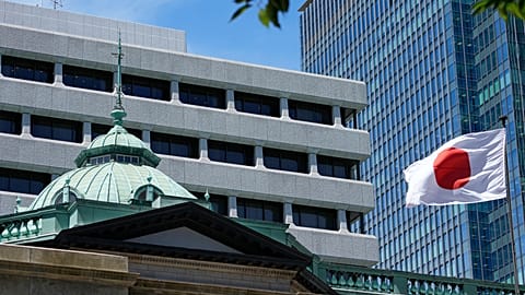 A Japanese flag flutters at the Bank of Japan headquarters in Tokyo, July 29, 2022
