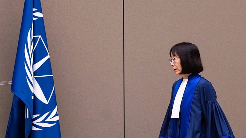 FILE: Judge Tomoko Akane walks before delivering the verdict in the Al Hassan case at the International Criminal Court in The Hague, Netherlands, Wednesday Nov. 20, 2024