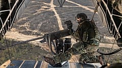 A soldier observes the surroundings at the M3M machine gun on the rear ramp of the CH-53 during the Griffin Lightning 2025 exercise in Lithuania, 10 May, 2025