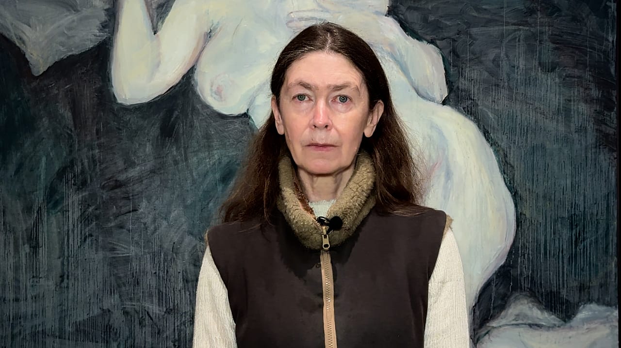 Celia Paul in front of her painting, 'Ghost of a girl with an egg' which can be seen until May 3, 2026 at the Museum of Modern Art in Warsaw.