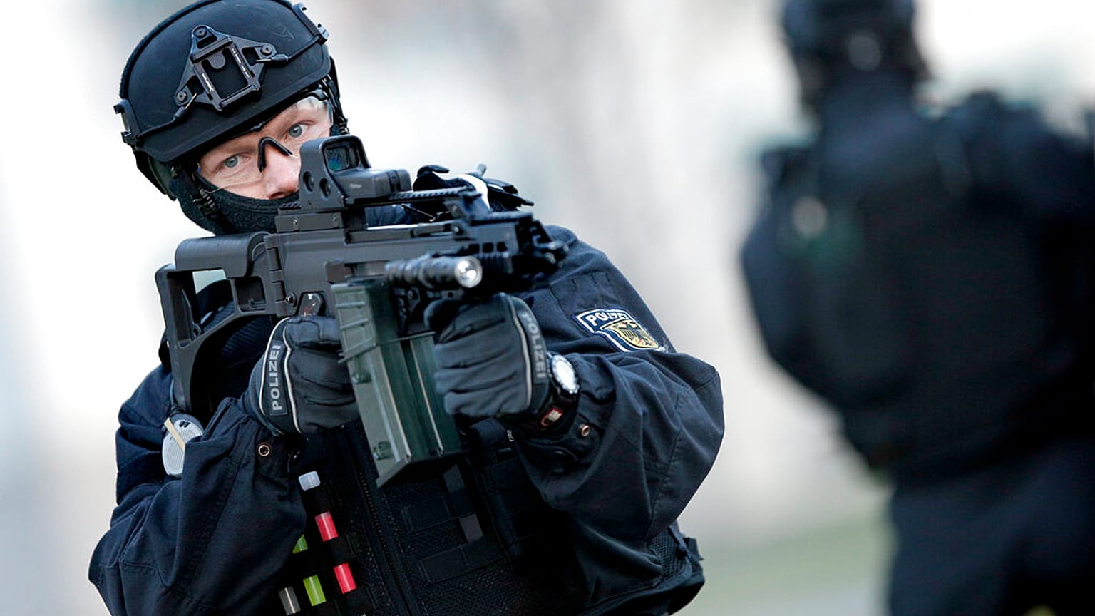 FILE: A Police officer holds a weapon during a training operation of the new BFE+ unit of the German federal police in Ahrensfelde near Berlin, 16 December 2015