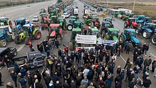Farmers and supporters block a highway at the Malgara toll stations near Thessaloniki, 3 December, 2025