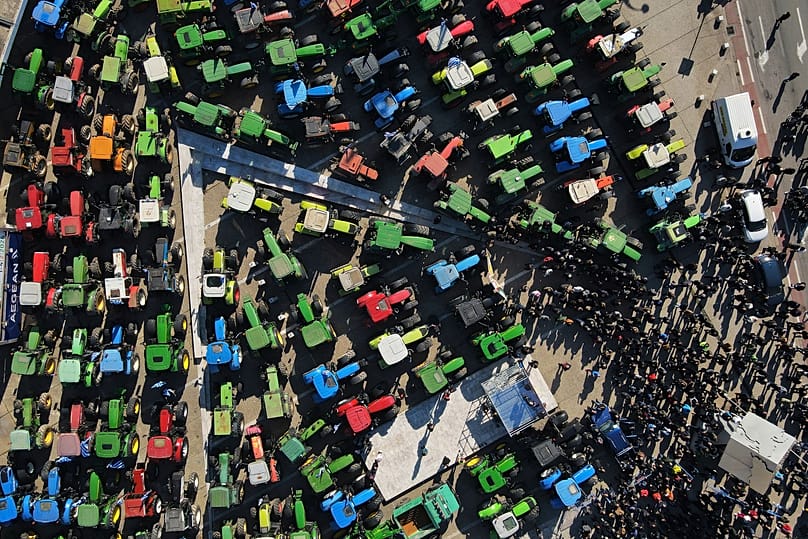 Protesting farmers with their tractors take part in a rally outside an agricultural fair in the port city of Thessaloniki, 1 February, 2024