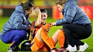 Netherlands' Damaris Egurrola is assisted after hitting her head during the qualifying soccer match for the 2025 European Women's Championship.