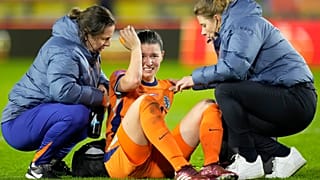 Netherlands' Damaris Egurrola is assisted after hitting her head during the qualifying soccer match for the 2025 European Women's Championship.