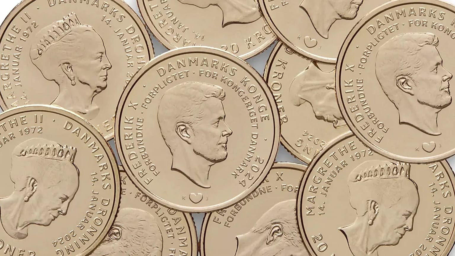 Las monedas antiguas con la imagen de la reina Margarita II, versus la nueva moneda con el rey Federico X. 