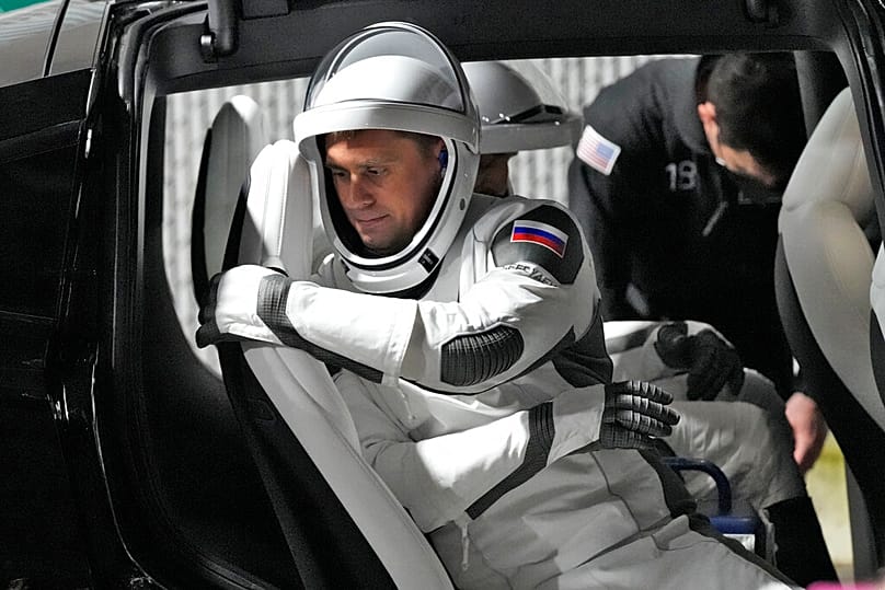 FILE: Russian cosmonaut Andrey Fedyaev gets into a car at the Kennedy Space Center in Cape Canaveral, 26 February 2023