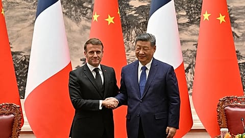 Chinese President Xi Jinping and Emmanuel Macron attend a welcome ceremony on the occasion of the French President's visit to China, 4 December, 2025