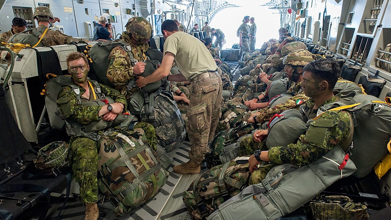 Paratroopers prepare for deployment onboard a US aircraft during the Swift Response 2017 international military exercise at Papa Airbase in Hungary, 18 July, 2017.