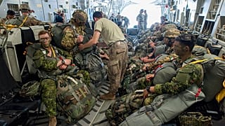 Paratroopers prepare for deployment onboard a US aircraft during the Swift Response 2017 international military exercise at Papa Airbase in Hungary, 18 July, 2017.