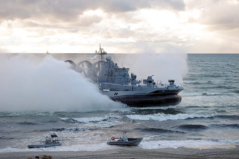 A military hovercraft approaches shore during the Russian-Belarusian West-2013 joint war games at the Khmelevka shooting range in Kaliningrad region, 26 September 2013