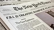 The front page of the New York Times at a news stand, 5 December, 2015