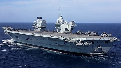 Military personnel participate in a NATO training exercise on board the UK Royal Navy aircraft carrier HMS Queen Elizabeth off Portugal, 27 May, 2021
