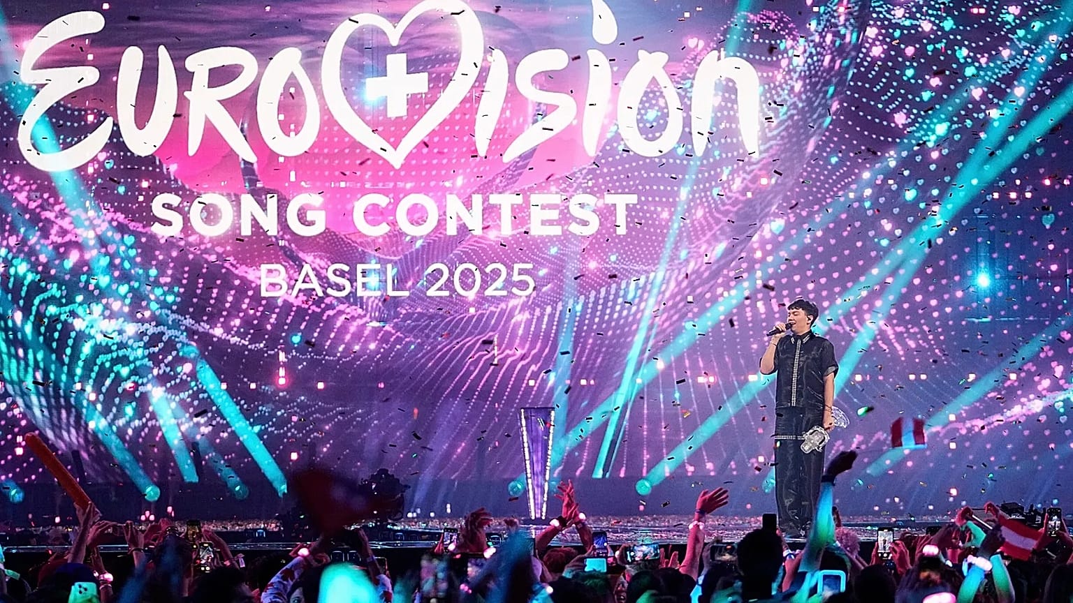 JJ, from Austria, stands on the stage with his trophy after winning the Grand Final of the 69th Eurovision Song Contest in Basel, 18 May, 2025