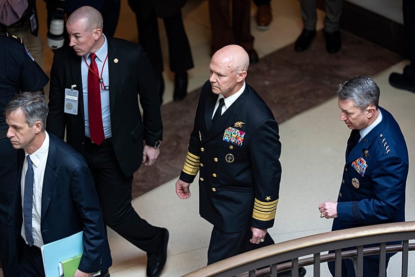 U.S. Navy Adm. Frank "Mitch" Bradley, center, commander of the U.S. Special Operations Command, 