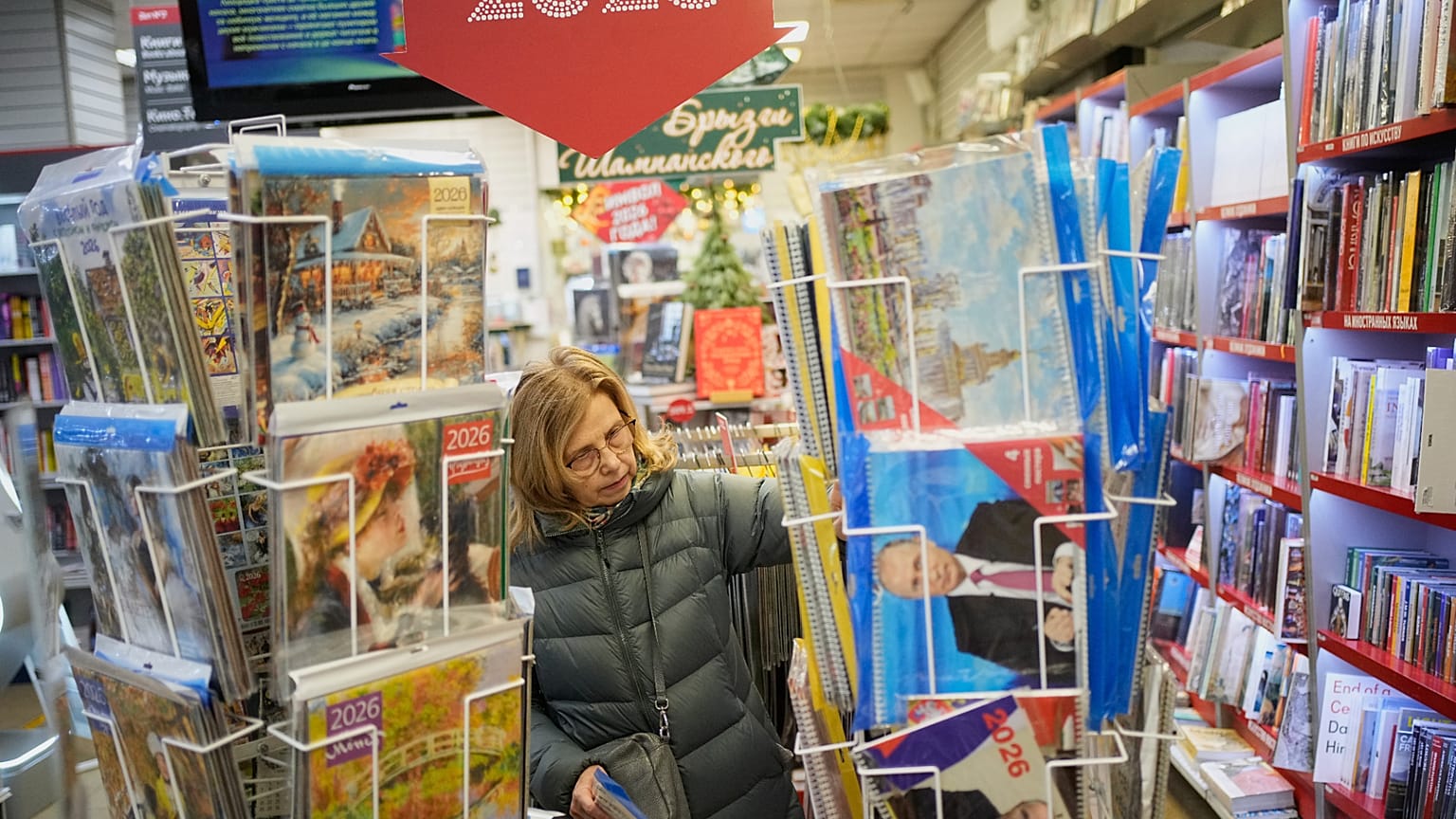 Calendars with portraits of Russian President Vladimir Putin are displayed in a bookstore in Moscow