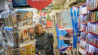 Calendars with portraits of Russian President Vladimir Putin are displayed in a bookstore in Moscow