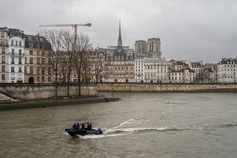 French police patrol on boat the River Seine in Paris, 8 December, 2024